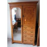 A satin walnut small mirror door wardrobe with cupboard and four drawers to one side, a similar