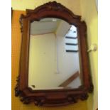 A mahogany mirror