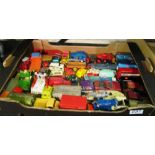 Four boxes of mixed toy cars, trucks et cetera