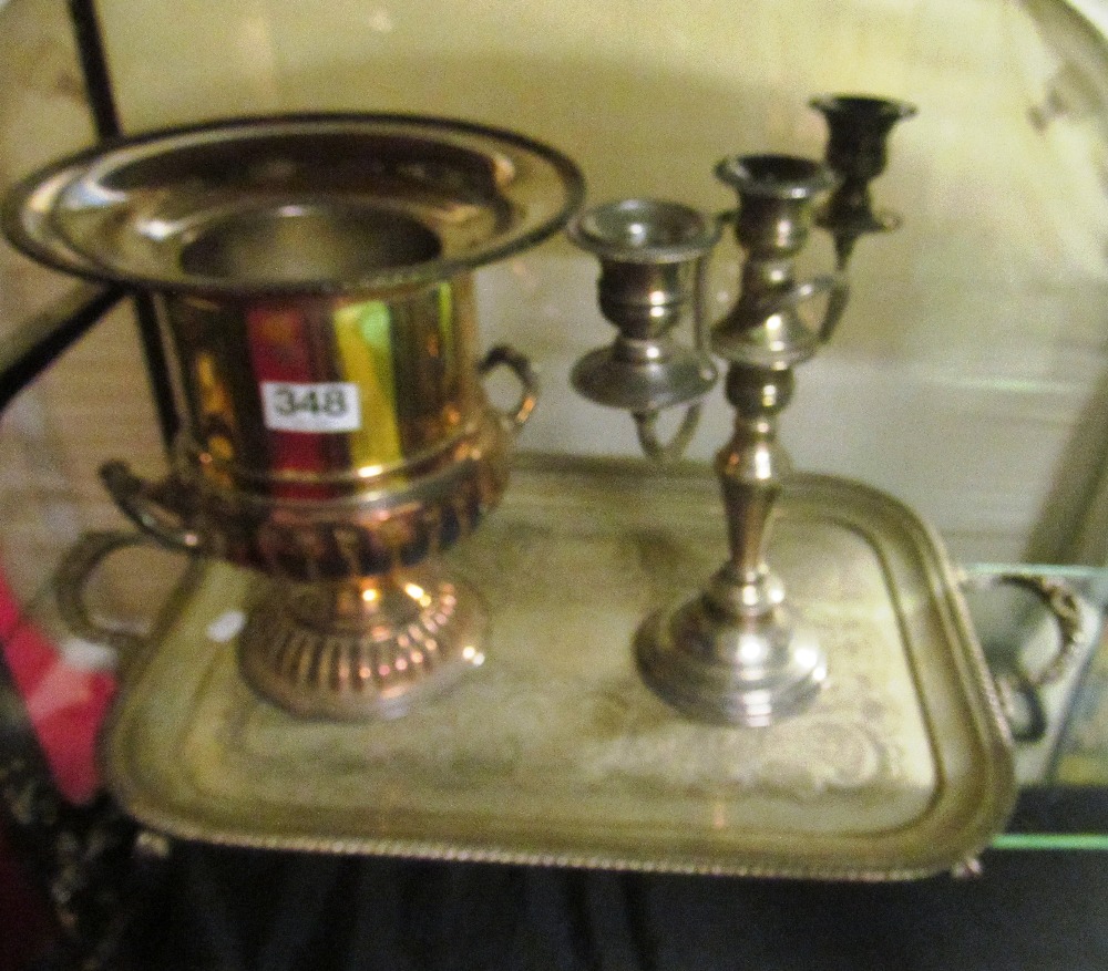 A plated ice bucket, tray and candelabra