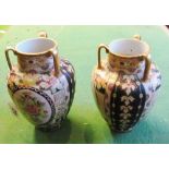 A pair of L & Co. Japanese vases floral design