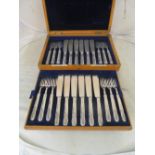 A set of twelve silver fish knives and forks (i.c)
