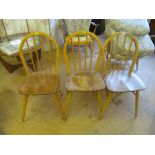 Three Ercol stick back chairs