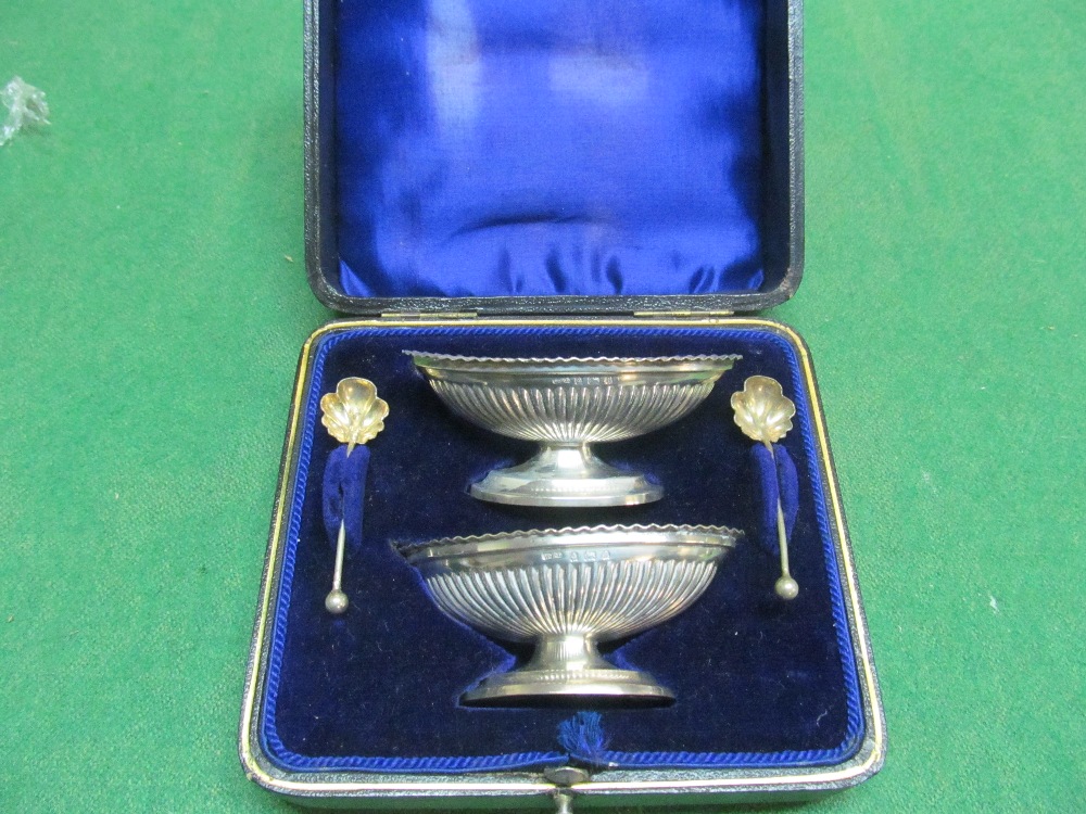 Two silver salts and spoons (i.c) 2oz