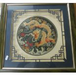 A framed modern oriental embroidery dragon design