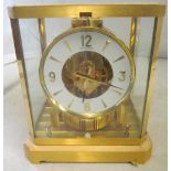 A Jaeger LeCoultre Atmos clock (locked for transport)