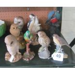 Eight various bird ornaments