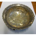 An embossed silver bowl