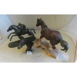 Two resin horse ornaments one with rider and a resin horses head