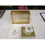 A Garrard & Co. Switch Quartz battery operated clock and a Buckingham Palace clock (boxed)