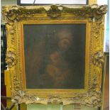 An oil of woman and child in gilt ornate frame