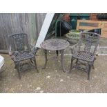 A small plastic garden table and two chairs rose design