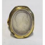 An oval glass intaglio ring
