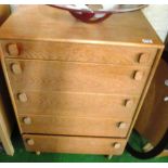 A Meredew retro style oak chest of five drawers