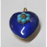 A blue enamel heart shaped pendant with turquoise and diamond flowerhead design