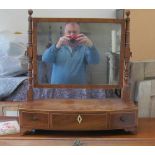 A 19th Century mahogany and satinwood toilet mirror with three drawers