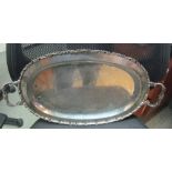 A silver coloured tray, marked 925 36oz