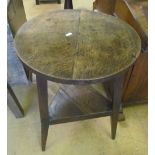 A 19th Century oak 'cricket' table with circular top