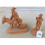 An Italian terracota model man on donkey and another boy playing pipe