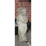 A stoneware garden statue classical lady