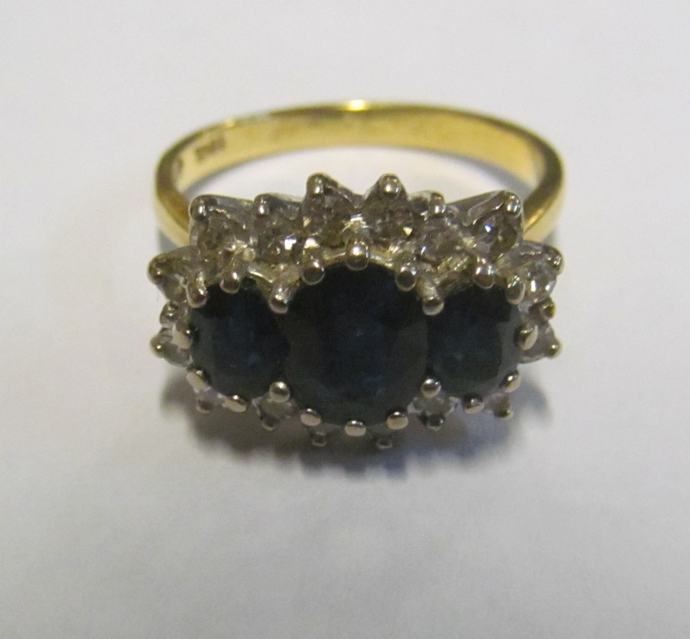 An 18ct gold sapphire and diamond ring, size N 6gm - Image 2 of 6
