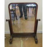 A 19th Century mahogany freestanding swivel mirror