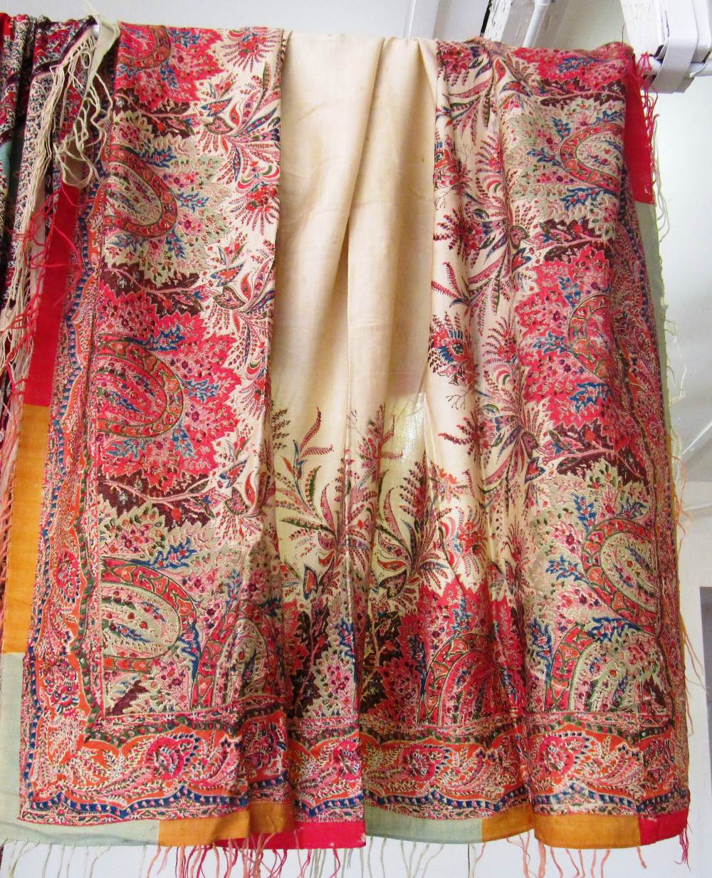 Three antique textiles, two with floral prints, one with embroidered edges and all with tassel - Image 2 of 6