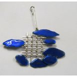 A blue cloud enamel pendant on grid skeleton