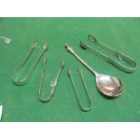 Three silver tongs, tongs and an apostle spoon