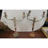 A pair of plated three branch candelabra