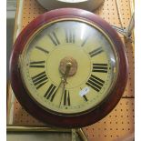 A circular mahogany wall clock