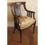 An Edwardian mahogany elbow chair with string inlay