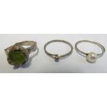 A silver naturalistic ring set green stone, pearl ring and another silver ring