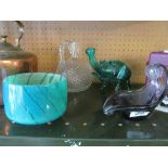 A Mdina green and blue swirl pattern vase, an elephant glass ornament and other coloured glass