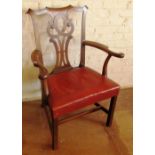 An 18th Century elbow chair with outswept arms and red leather seat
