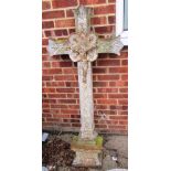 A metal garden cross