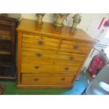 An Edwardian oak chest two short and three long drawers