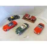 Five 1/18 model cars (no boxes)