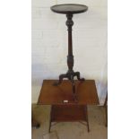 A mahogany rectangular two tier occasional table on ring turned supports and a mahogany torchere
