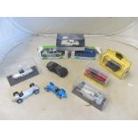 A Dinky Aston Martin DB5, two Corgi Mobil models Mercedes 190E and BMW 325i and various other
