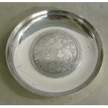 A Cypriot silver coloured circular dish marked 830