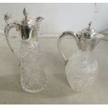 A silver mounted cut glass claret jug and a plated claret jug