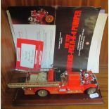 A model fire engine 1922 Ahrens-Fox R-K-4 Pumper by Franklin Mint with certificates