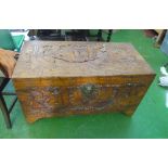 An oriental carved blanket chest
