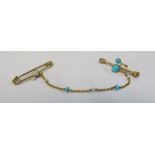 A turquoise and pearl double brooch with chain