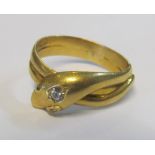 An (18ct?) gold snake ring set diamond, 8.5g size V/W