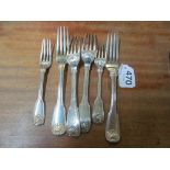 Four silver forks and two silver dessert forks