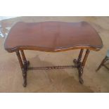 A Victorian mahogany occasional table and another
