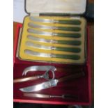 Six cake knives (i.c) and cheese and bottle opener set