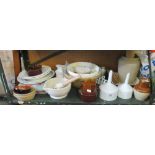 Some kitchenware including pestle and mortar and a pair Royal Worcester funnels